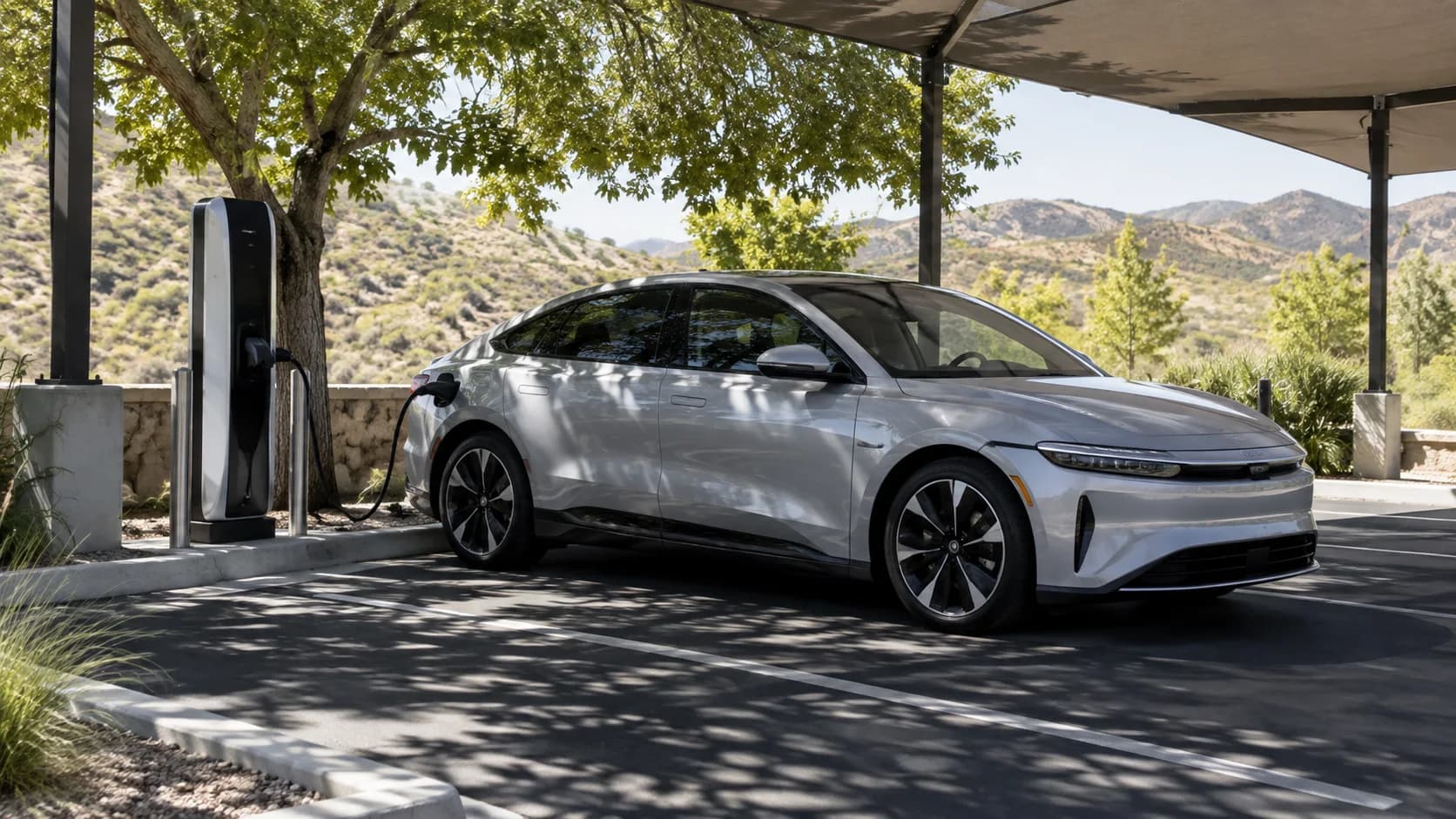 Electric car charging in hot weather, with a visible battery temperature warning on the dashboard.