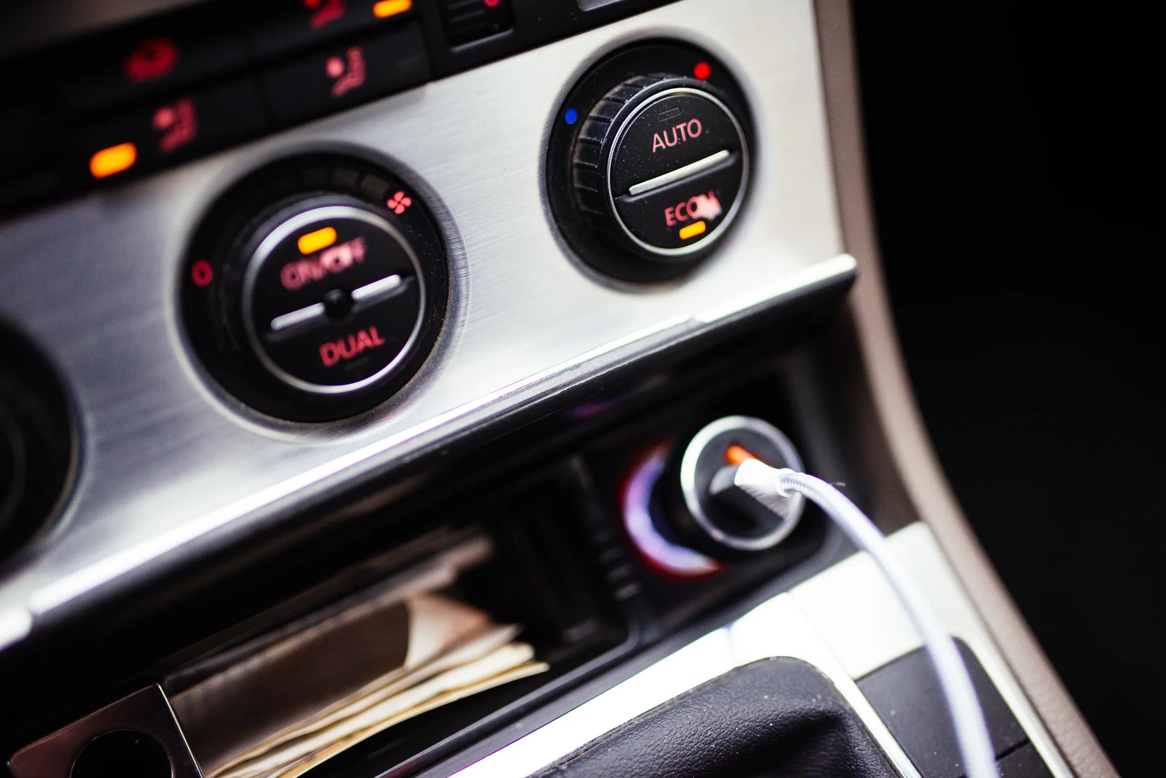 Dashboard controls and air-conditioning settings inside a car