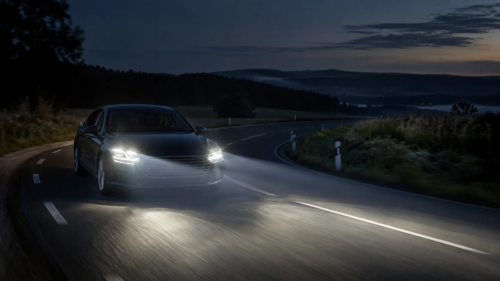 Close-up of a modern car's Matrix LED headlight array, showcasing individual LED elements and lenses.