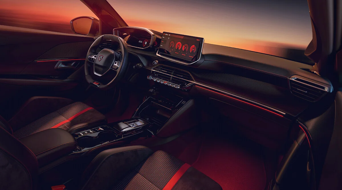 Peugeot E-208 GTi cabin with black and red seats and two digital displays